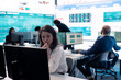 © DC Studio - Project manager examining key performance metrics to ensure global business success, working with annual infographics to understand what needs improving. Multinational company activities.