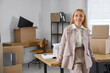 © Pixel-Shot - Portrait of mature businesswoman in office on moving day