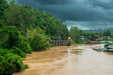 trains running on death railways track crossing kwai river in kanchanaburi thailand these railways important destinations of World War II history built by soldier prisoners