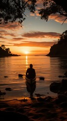 Wall Mural - Silhouetted kayaker at sunset