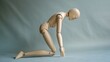 © Sinechana - 2408 17.A wooden mannequin model posed in a bent position, one hand resting on its hip as it hunches over, symbolizing severe back pain. The body language conveys the strain and discomfort typically