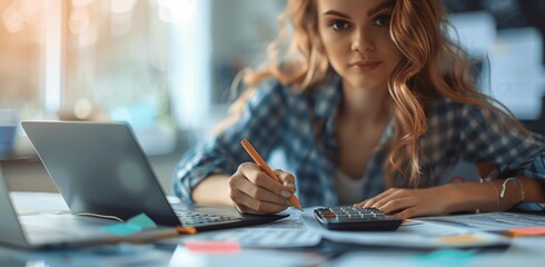 Poster - Closeup business woman working on financial report with calculator and laptop at office, analyzing finance and doing tax calculations