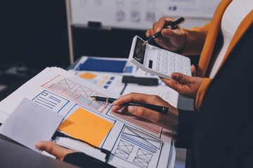 The designer team is designing the uxui system to make the uxui system work well on new phones and support system updates. Website development concept UI UX front end designer