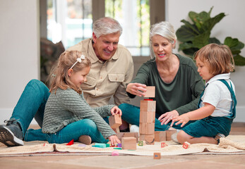 Wall Mural - Playing, children and grandparents in house, building blocks and bonding of family, growth and development. Games, kids and learning with toys, people and smile in living room, floor and fun in home