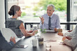 © ThurstanJam/peopleimages.com - Leader, conversation and business people in meeting, planning or opportunity for company development. Employees, coworkers or consulting agency for financial growth, accounting or investment service