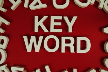 Aufkleber - Keyword alphabet letters on red background