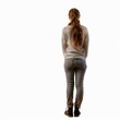 © nsit0108 - Young woman with long hair is standing with her back to us, looking away from the camera