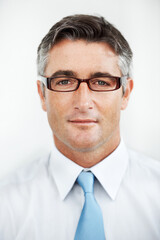 Poster - Portrait, glasses and mature business man, politician or government official. Face, eyewear and confident professional, manager or campaign director with experience on white studio background in USA