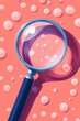 © Alla - A magnifying glass on a pink background surrounded by soap bubbles