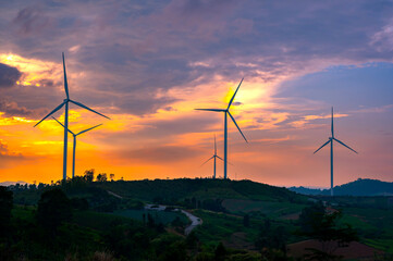 wind turbine in the countryside in the time of sunset background. wind turbines at sunset. aerial vi