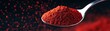 © Wed - Spoonful of red spice powder with dramatic bokeh effect