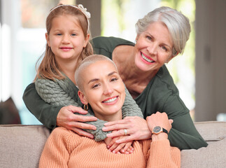 Poster - Women, generations and family with smile on sofa at home for support, care and bonding in Germany. People, mother and grandmother with girl child on portrait in living room for visit, break and relax