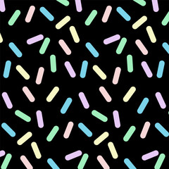 Wall Mural - geometric seamless pattern.abstract repeat pattern with colorful pastel pills isolated on black back