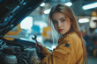 © Dmitriy - Girl a car mechanic with a wrench on a broken car background.