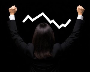 A person celebrates a financial success with raised arms against a dark background, symbolizing growth and achievement.