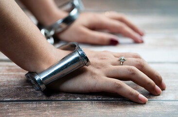 Woman hands with handcuffs