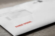 © Christian - Payment overdue letter stamped in red on an envelope. Cost of living debt concept
