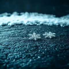 Poster - Delicate snowflakes on a dark, textured surface create a serene winter atmosphere.