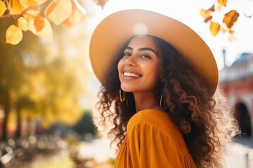 Poster - Beautiful african american woman in hat walking in autumn park