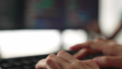 Slow motion closeup hand, back end software developer engineer for computer programming working together on debugging writing computing code, solving complex algorithms display on monitor. Burgeoning