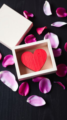 Wall Mural - red wooden heart a frame with delicate pink petals