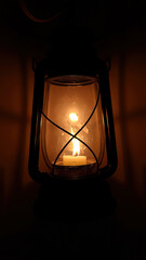 Canvas Print - vintage lantern casts a warm glow the darkness