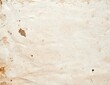 © zetrum - rough old paper background in light colors with ink and coffee stains, as well as rough edges