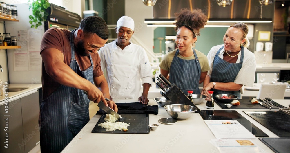 Cooking, class and chef teaching students in kitchen for knife skills ...