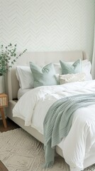 Aufkleber - Stylish bedroom featuring soft mint chevron wallpaper, a cozy bed, and modern decor for a serene retreat