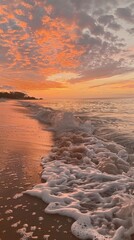 Poster - Vibrant beachside sunrise with gentle waves lapping at the shore under a colorful sky