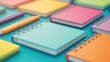 © VISA-3UK - Vibrant collection of colorful notebooks and stationery on a teal background a visual delight for creatives and students