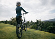 © lzf - Riding folding bike to tropical mountain peak
