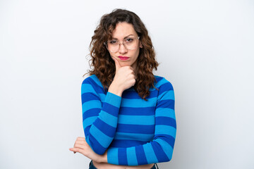 Wall Mural - Young caucasian woman isolated on white background having doubts