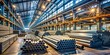 © Wanlop - Industrial Warehouse with Steel Pipes Storage | Candid Photography of Industrial Spaces, Warehouse Interiors, Steel Pipe Inventory, Heavy Machinery, and Manufacturing Environments