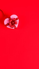 Sticker - heart-shaped gift box with a red bow