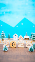 Sticker - wooden block numbers spell out 2025 a festive wintery scene