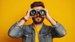 © ArmStrong☠ - A young man looks through binoculars against a yellow background.
