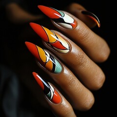 Poster - Elegant female hand adorned with a creative nail design blending bright and muted colors in an abstract art style positioned against a sleek black backdrop to emphasize the stunning manicure