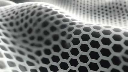 A white fabric with a mesh pattern