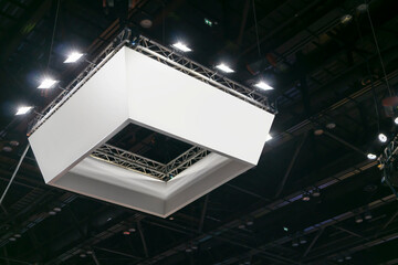 Poster - Mock up a large brand sign hanging from the ceiling to display an exhibition. Mock up a large brand sign to convey the brand.