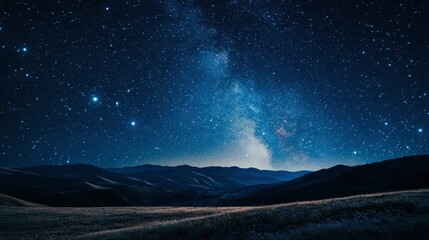 A night sky filled with stars and the Milky Way galaxy over a peaceful rural landscape with rolling hills.