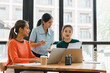 © PRIME STOCK LAB - Collaborative meeting among three women in modern office setting, discussing documents and ideas. atmosphere is focused and productive, showcasing teamwork and communication