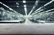 © Agil - blurred background of factory and empty metal tabletop in foreground. Business presentation