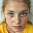 © kapatata - The image is a close-up of a young girl