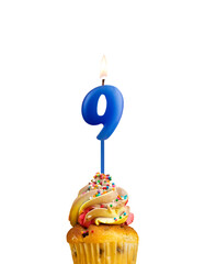 Canvas Print - Candle in shape of the number 9 - Blue birthday on a white background.