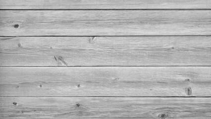 Poster - A wooden background with a few small holes. The background is mostly white with some brown spots. The background is a simple, clean, and natural look