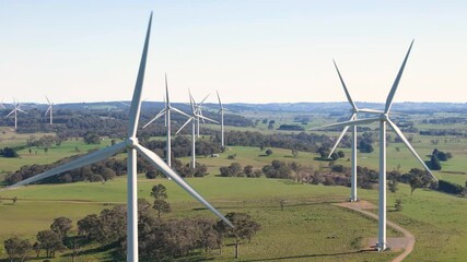 Wall Mural - aerial drone view of an array of large wind turbines at biala and gullen range wind farm, bannister 