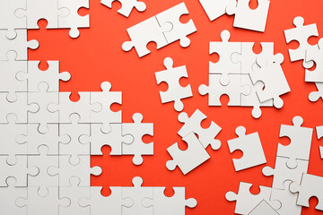 Sticker - White puzzle pieces on red background, top view