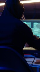 Poster - vertical video hooded man in underground hideaway listening and breaking into computer systems to ac