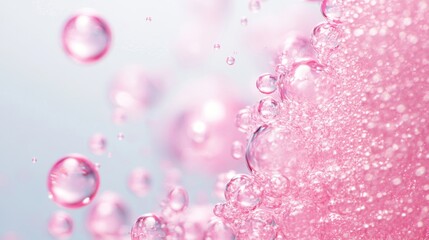 Poster - Pink bubbles float in a clear liquid, enhancing a soothing atmosphere with vibrant colors and delicate textures